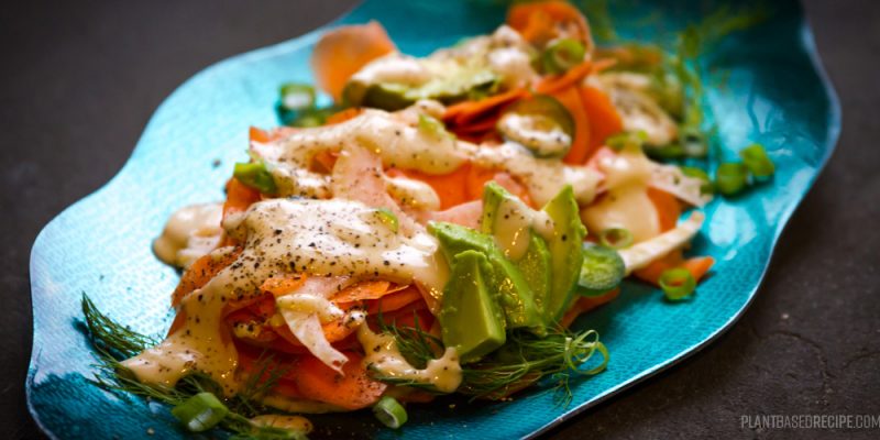 Carrots, avocado and fennel drizzled with a tahini sauce