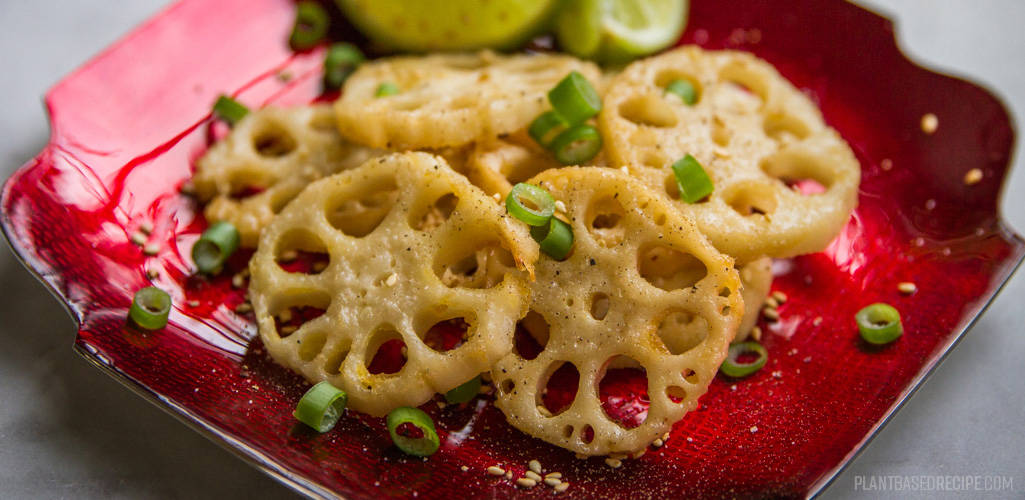 baked lotus root - sesame ginger - on a plate