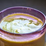 creamy green smoothie with tropical flavors