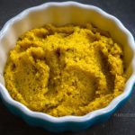 Golden beet spread in a dish.
