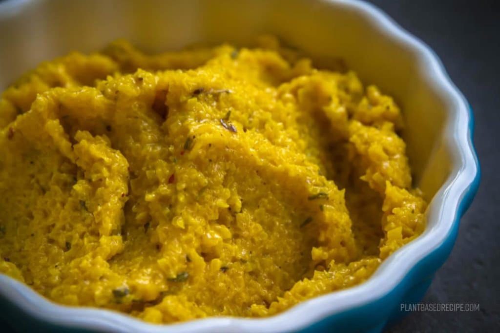 Beet spread in a bowl, close up.
