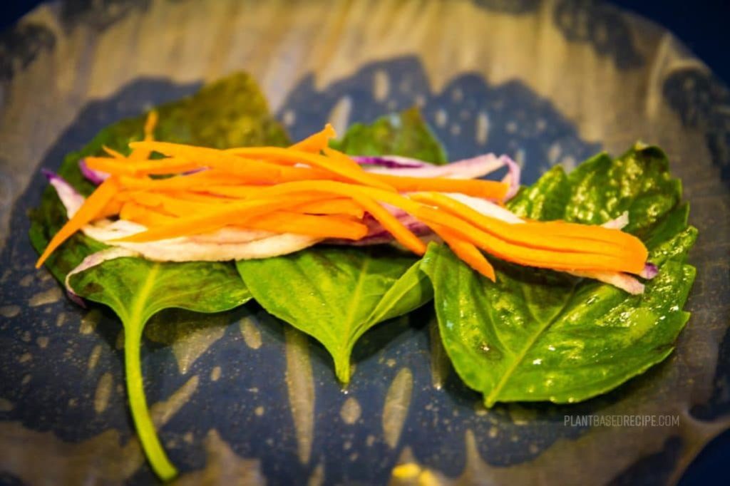 Vegetables inside a spring roll.