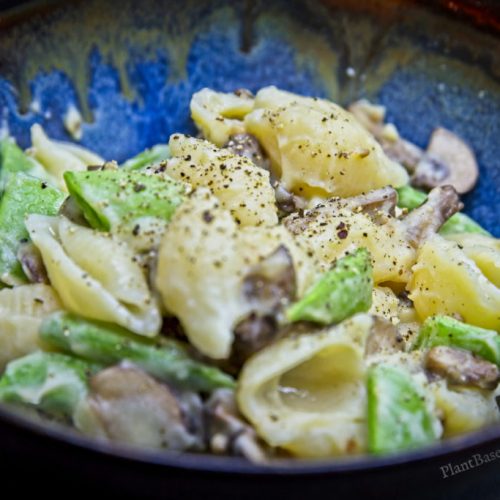Creamy vegan garlic sauce with pasta and vegetables