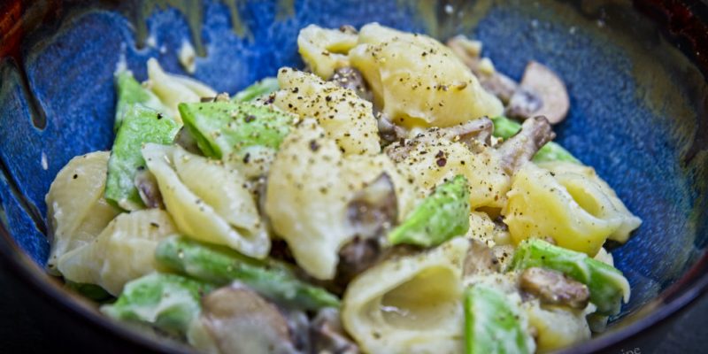 Creamy vegan garlic sauce with pasta and vegetables