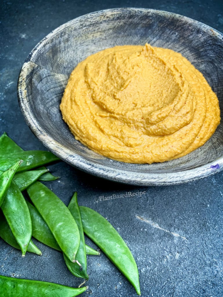 Creamy oil free vegan hummus spiced with curry.