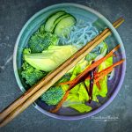 Deluxe sunomono salad recipe includes a bunch of vegetables in broth.