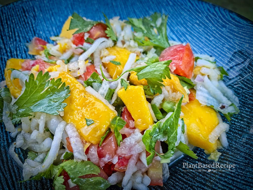 Mango and tomatoes with daikon in a citrus dressing - vegan ceviche.
