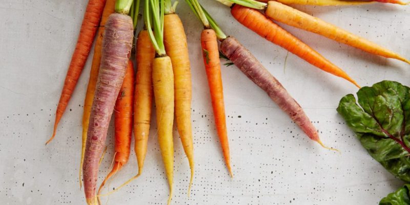 Carrots on a table - plant-based foods make up a plant-based diet.