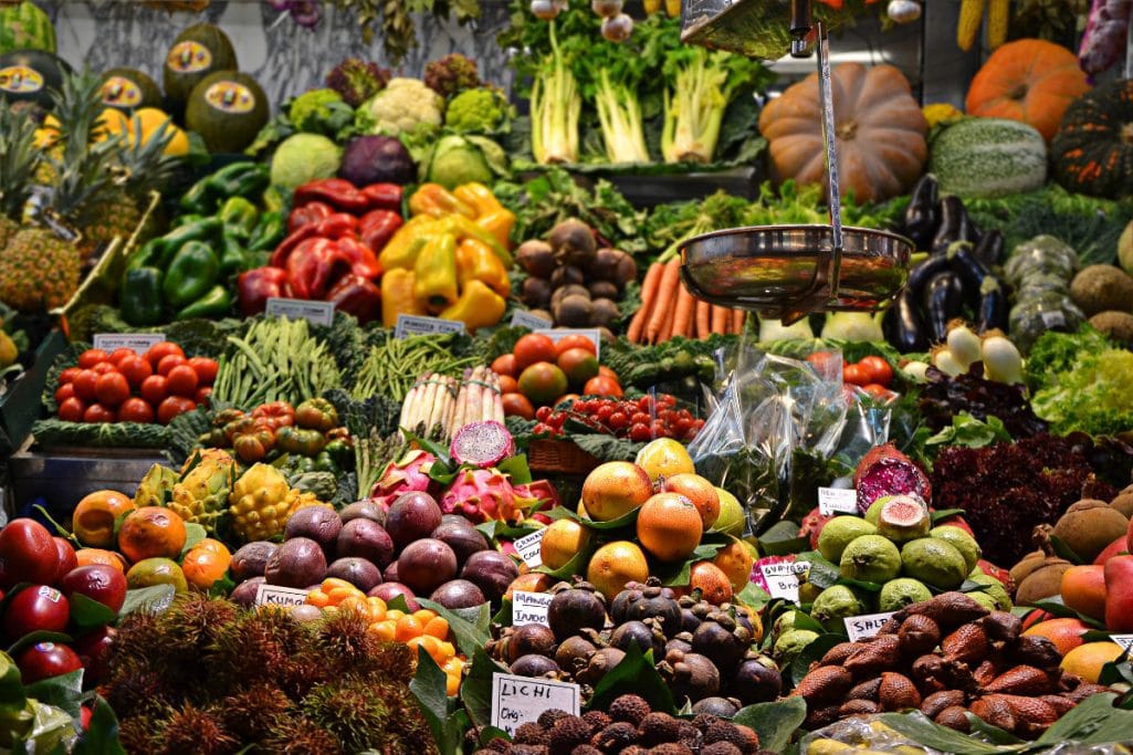 Many market vegetables - learn about the definition of plant-based diet.