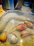 Garlic in hot water in a bowl