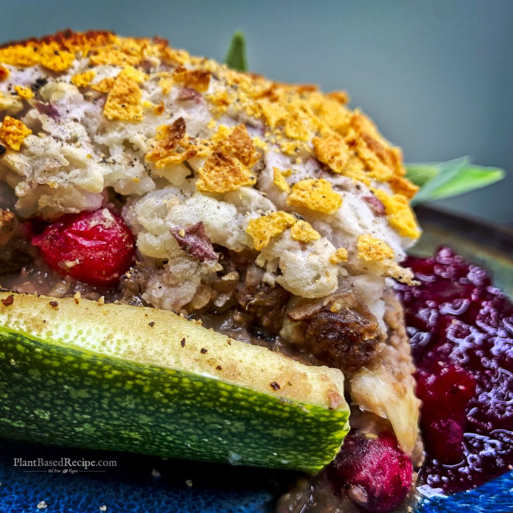 close up of the holiday zucchini boat with cranberry